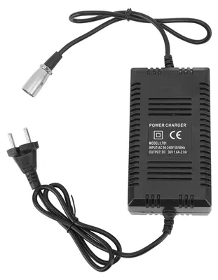A black power charger with cables and plugs.