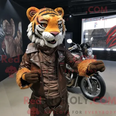 Produktbild von Brauner REDBROKOLY Tiger Maskottchen Kostüm Charakter gekleidet mit einer Bikerjacke und Schals