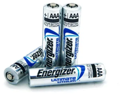 Four Energizer Lithium AAA batteries are arranged on a white background.