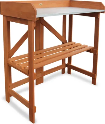 A wooden potting table with a metal top and a lower shelf, shown against a white background.