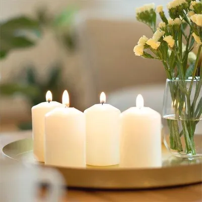 Productafbeelding van Famanu Stumpenkaarsen Set - Ongeparfumeerd, 4 x 7 cm, brandduur van 11 uur