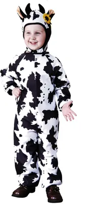 A young child wearing a cow costume.