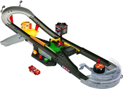 Produktbild von Disney Piston Cup Action-Rennstrecke mit Lightning McQueen Die-Cast Spielzeugauto, Fahrzeug- & Schienen-Set, Maßstab 1:55, B: 1031 mm, T: 372 mm, H: 185 mm, aus Kunststoff & Metall, Mehrfarbig, 20 Teile, keine Batterien nötig, ab 4 Jahren, inkl. Siegerehrung