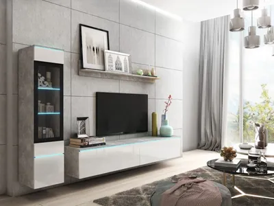 A modern living room with a wall-mounted entertainment unit.