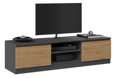 A modern TV stand with a television on top.