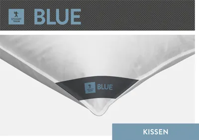 A close-up view of a white pillow with a dark blue label indicating the brand and product name.