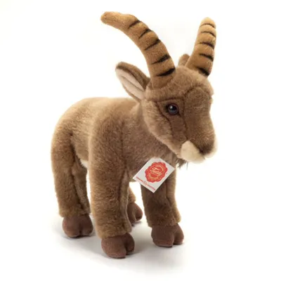 A stuffed toy steinbock on a white background.