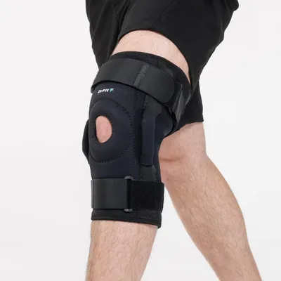 Zdjęcie produktu dla DrFit Zawiasowy stabilizator kolana z neoprenu z otworem na rzepkę