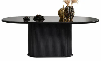 Produktbild von Eleganter Esstisch mit schwarzer Glasplatte und ribbeltem Sockel