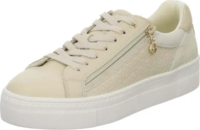 A single beige sneaker with a white sole and laces, shown from a side-angle.