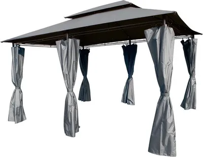 A gray gazebo with curtains hanging down.