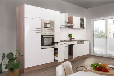 A modern, white and wood-grain kitchen unit with integrated appliances.