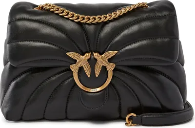 A black quilted leather handbag with gold hardware.