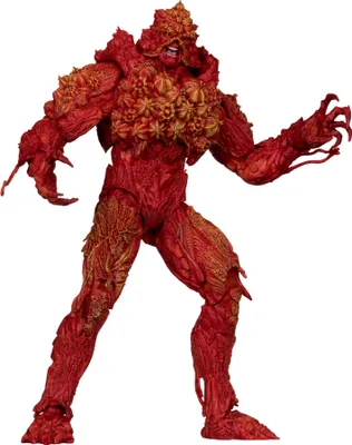 A full-body shot of a red, plant-like action figure against a white background.