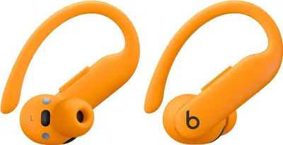 Two orange Beats Powerbeats Pro earbuds are shown against a white background.