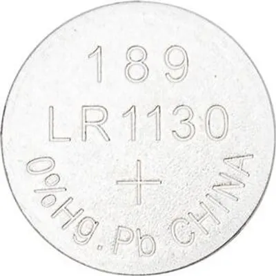 A single silver coin-shaped battery with text and symbols embossed on its surface.