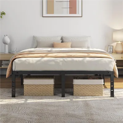 A black metal bed frame with a mattress and bedding, placed in a bedroom setting with nightstands and artwork on the wall.