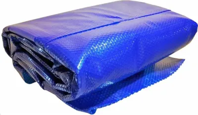 A folded blue solar cover is shown against a white background.