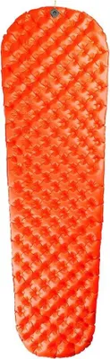 An orange inflatable sleeping pad.