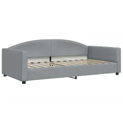 A grey fabric daybed with a wooden slatted base is shown from a side angle against a white background.
