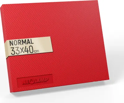 A red balance pad with a textured surface, shown at an angle on a white background. A beige label with black text is wrapped around the pad.