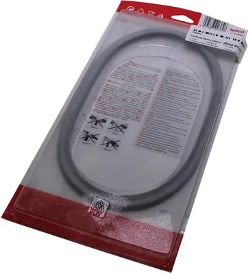 A product packaged in clear plastic, showing a gasket and instructions.