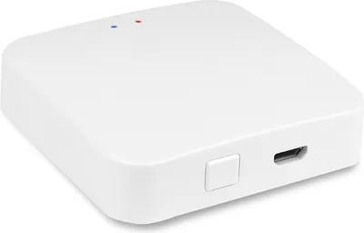 A white square electronic device with rounded corners is shown from a slightly elevated diagonal angle.