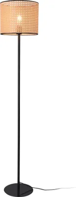 A floor lamp with a woven shade.