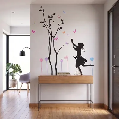 Produktbild von Dekorative Wandaufkleber mit einem Baum, einem kleinen Kind und Schmetterlingen.