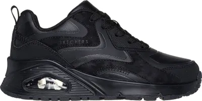 A black Skechers Uno Gen1 sneaker shown from the side.