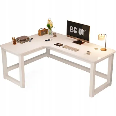 A white L-shaped computer desk with office supplies and a computer setup.