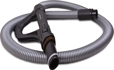 A vacuum cleaner hose and handle with a brush attachment, coiled on a white background.