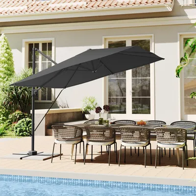 An outdoor patio scene with a dining set and a large cantilever umbrella next to a swimming pool.