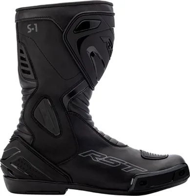 A black motorcycle boot is shown against a white background.