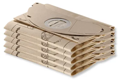 A stack of paper vacuum cleaner bags.