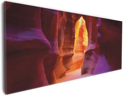 Produktbild von Wallario Premium Leinwandbild Felsschlucht in Arizona USA - orange und violett in Größe 30 x 75 cm