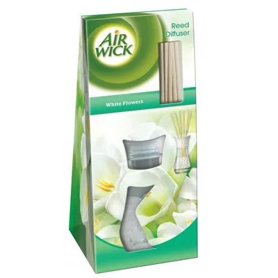 The image shows the retail packaging for an Air Wick reed diffuser with a "White Flowers" scent.