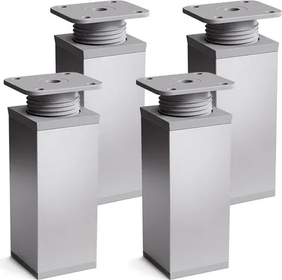 Four modern furniture feet are shown against a white background.