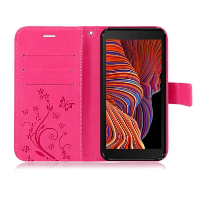 A pink flip case for a smartphone, open to reveal the phone screen and card slots.