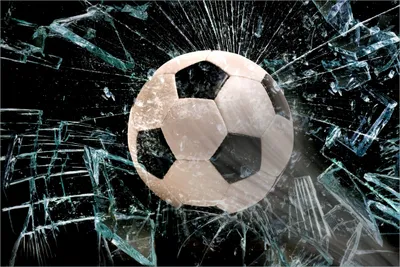 Produktbild von Wallario selbstklebendes Poster - Fußball - im Fenster, Splitter und Glas, Größe: 61 x 91,50 cm