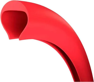 A close-up, angled view of a red bicycle tire insert.
