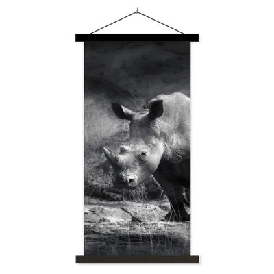 Produktbild von MuchoWow® Textilposter Rhinozeros - Natur - Gras - Schwarz - Weiß 90x180 cm mit schwarzem Rahmen - Dekoration Wohnzimmer