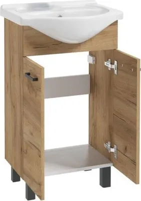 A bathroom vanity with a sink and cabinet.