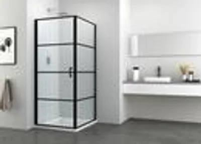 A modern bathroom with a black-framed glass shower enclosure.