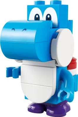 A close-up studio shot of a blue LEGO Yoshi figure.