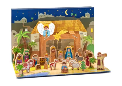 A wooden nativity scene advent calendar with figures and animals.