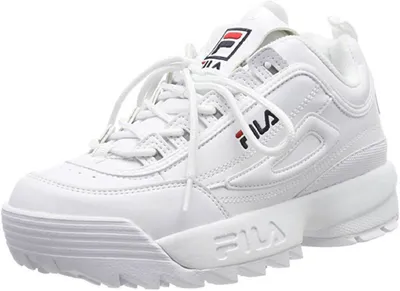 A white Fila Disruptor Low sneaker is shown from a side angle against a white background.