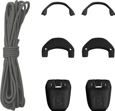 A collection of Salomon Quicklace components, including a gray cord and several black plastic pieces.