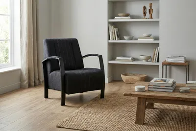 Produktbild von Eleganter Sessel Looft schwarz mit Federkern – Ergonomisch & Wasserabweisend – Modernes Design für Wohnzimmer & Büro