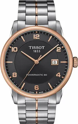 A close-up studio shot of a Tissot watch.